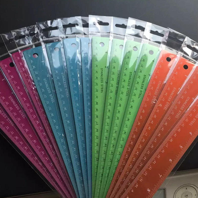 Colored stainless steel corked- backed ruler
